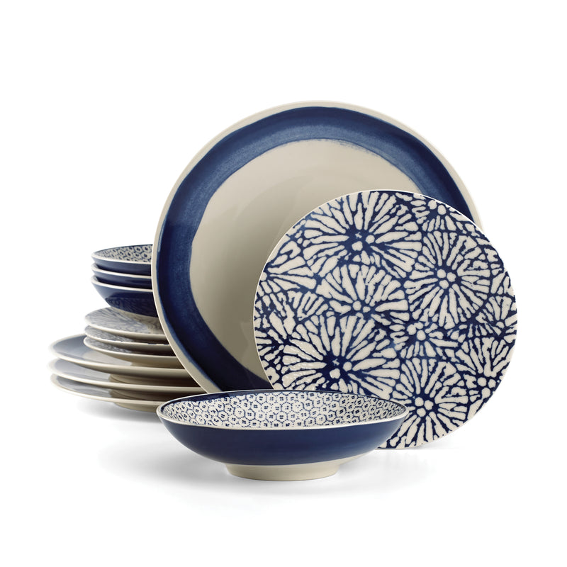 Indigo dinnerware set with blue rim and white-blue floral pattern plates and bowls