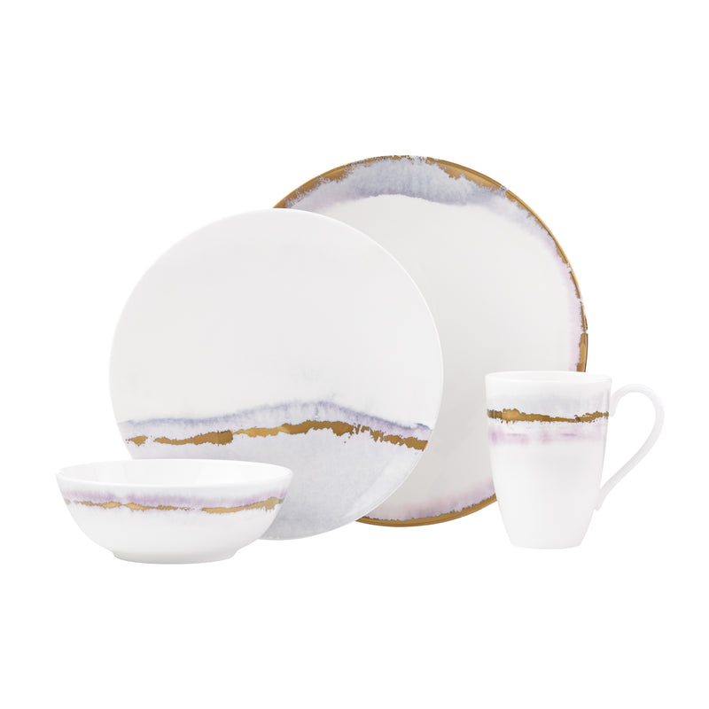 Porcelain place setting: white dinner plate, bowl, and mug with gold rim and soft purple band