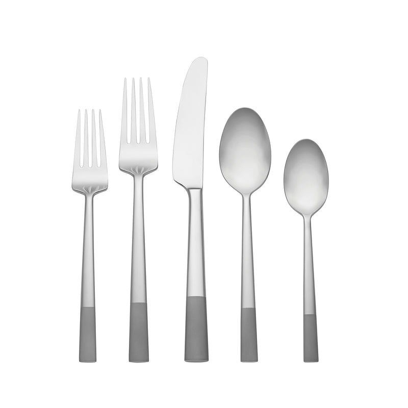 Stainless steel flatware set with forks, knives, and spoons, polished silver finish