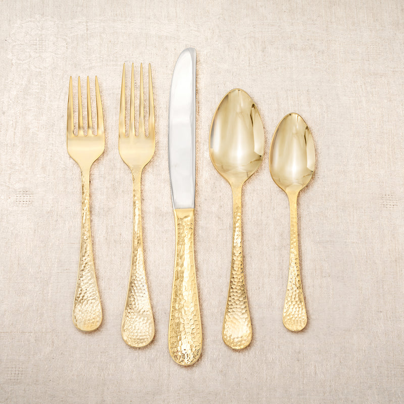 Gold-plated stainless steel flatware set, includes forks, spoons, and butter knife