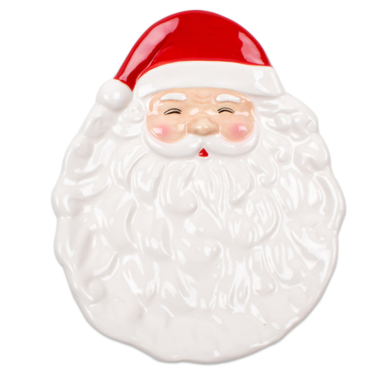 Santa face dessert plate with red hat and white beard, glossy ceramic.