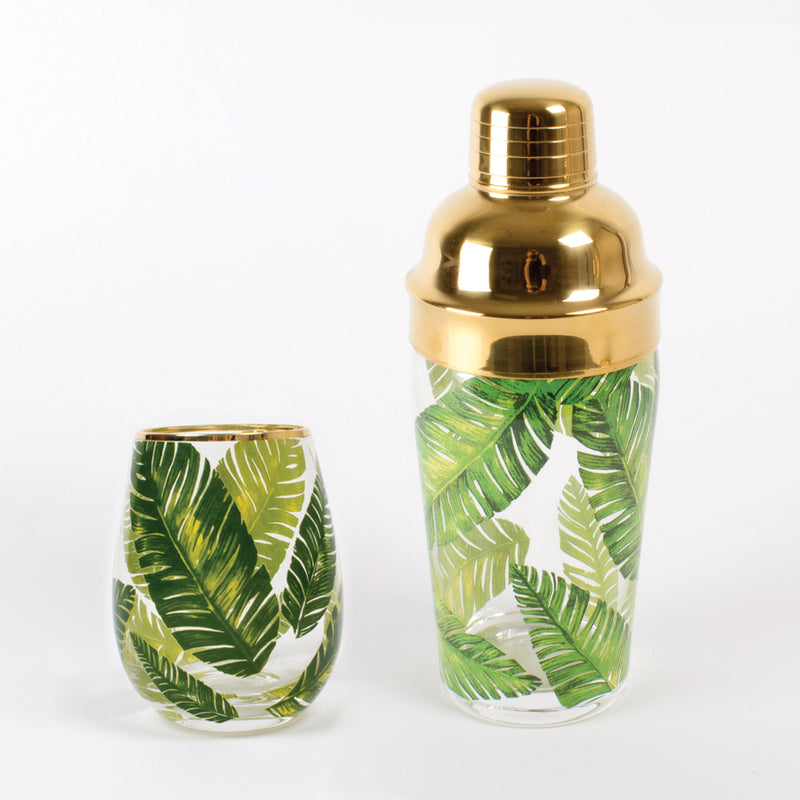 Leaf-print cocktail shaker with gold-tone lid and green tropical leaf design