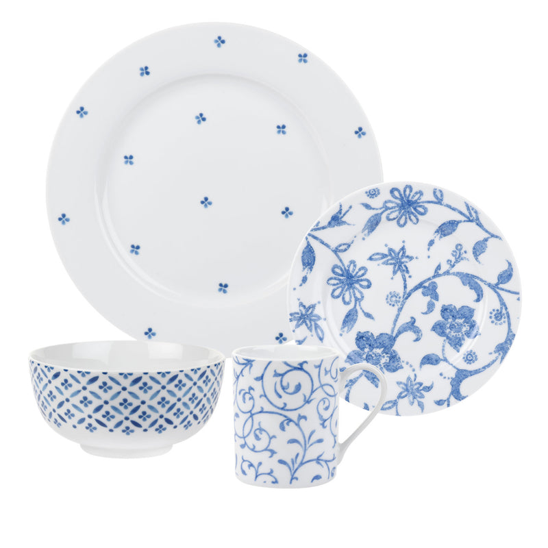 Blue and white floral porcelain dinnerware set: dinner plate, bowl, and mug