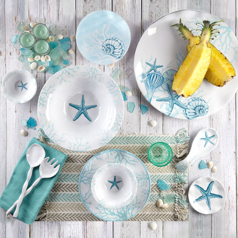 Melamine dinnerware set with white plates and blue sea-life prints, seashells
