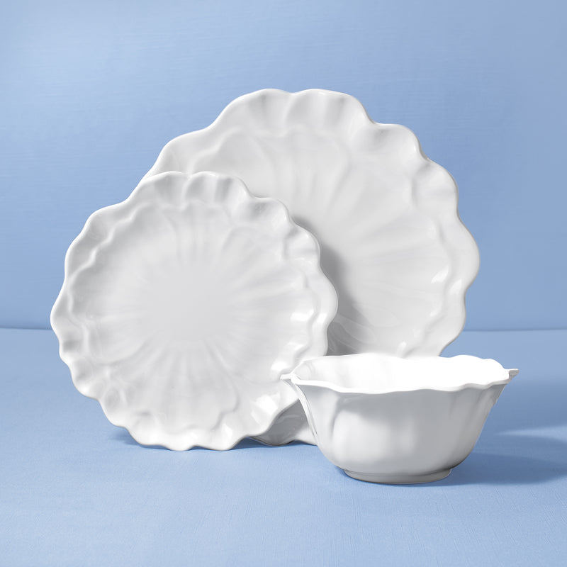 White scalloped melamine dinner plates and bowl with embossed floral pattern