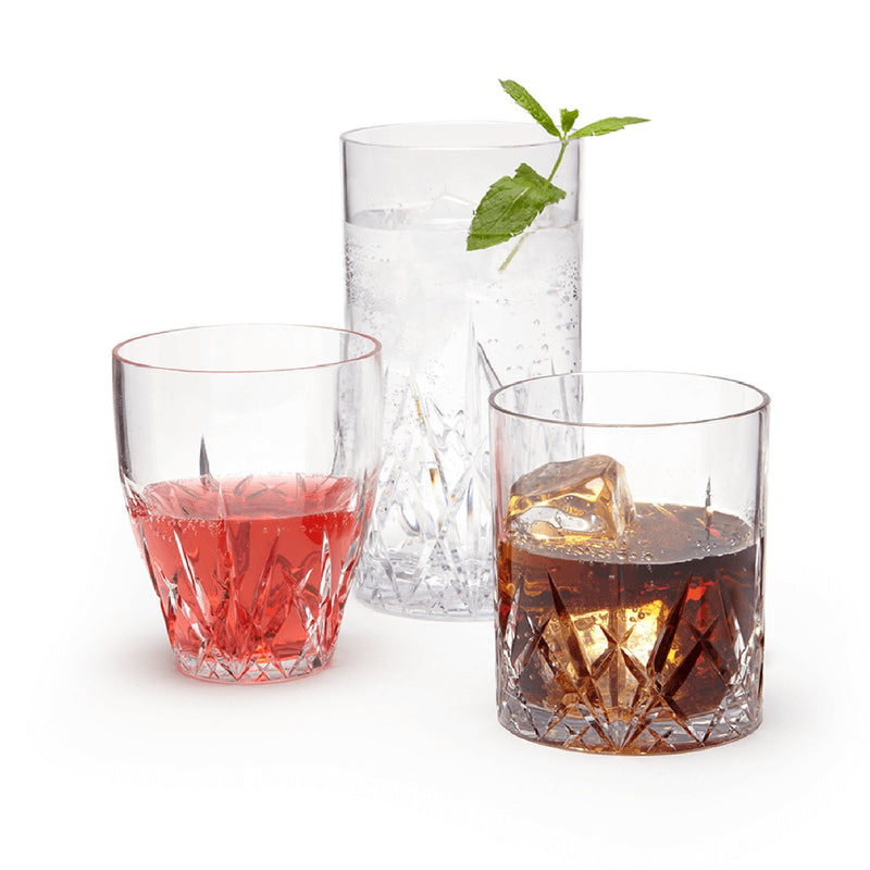 Clear acrylic drink glasses with faceted pattern, set of tumblers with colored liquid