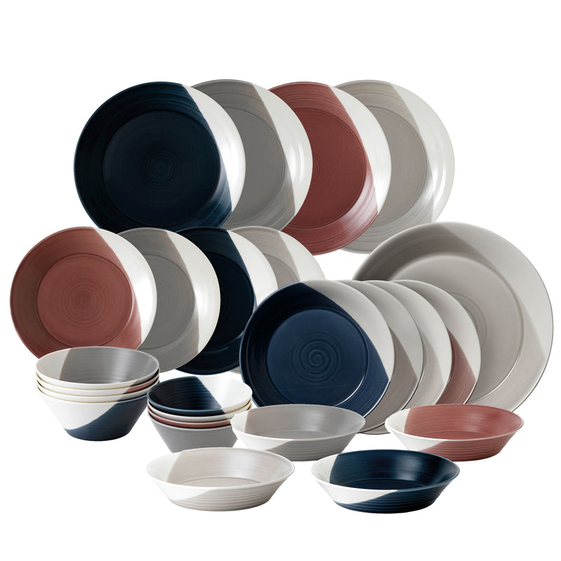 Assorted dinnerware set of bowls and plates in white, gray, navy, and terracotta tones