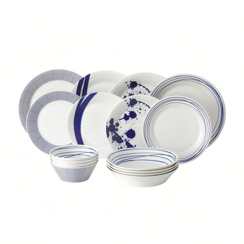Royal Doulton Pacific 16-piece dinnerware set in white with navy blue rim and splatter