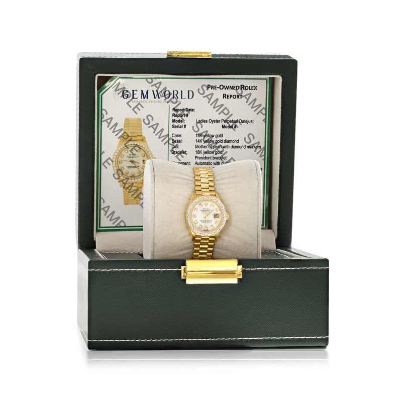 Yellow gold Rolex Datejust watch shown in report box with yellow bracelet