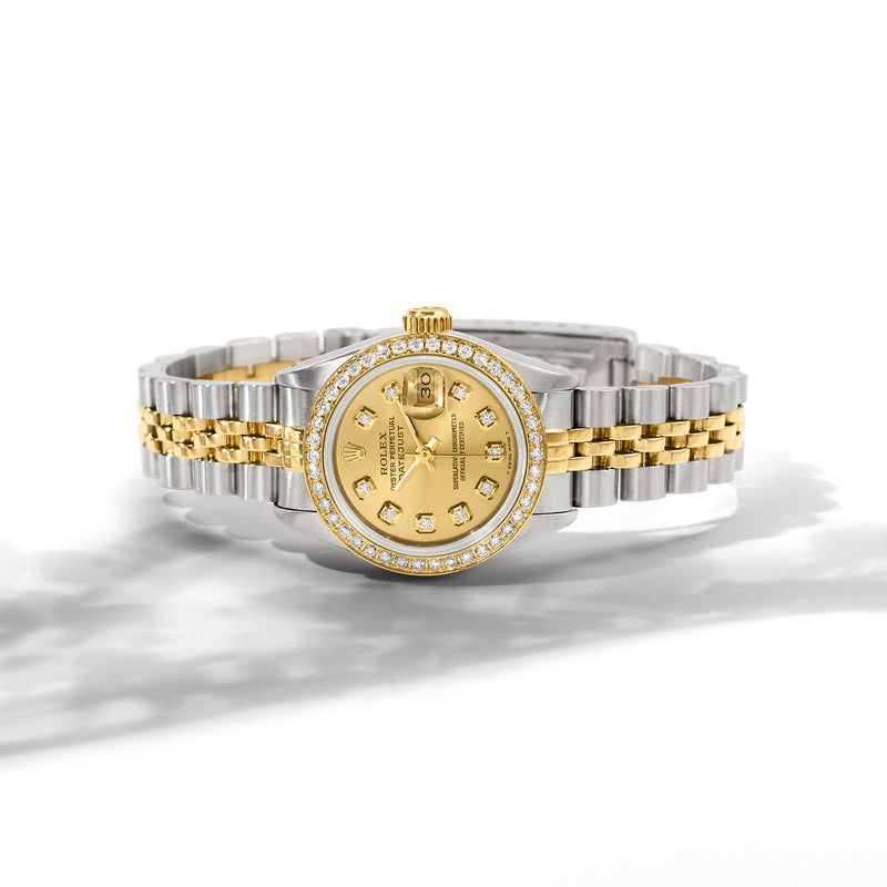 Rolex Datejust women's watch with gold-and-steel two-tone bracelet, diamond bezel, champagne dial