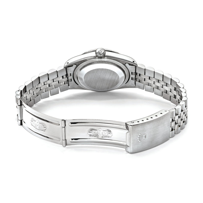 Stainless steel watch caseback and clasp with linked metal bracelet
