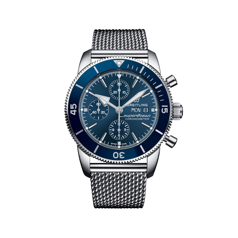 Stainless steel chronograph watch with blue dial, rotating bezel, mesh bracelet