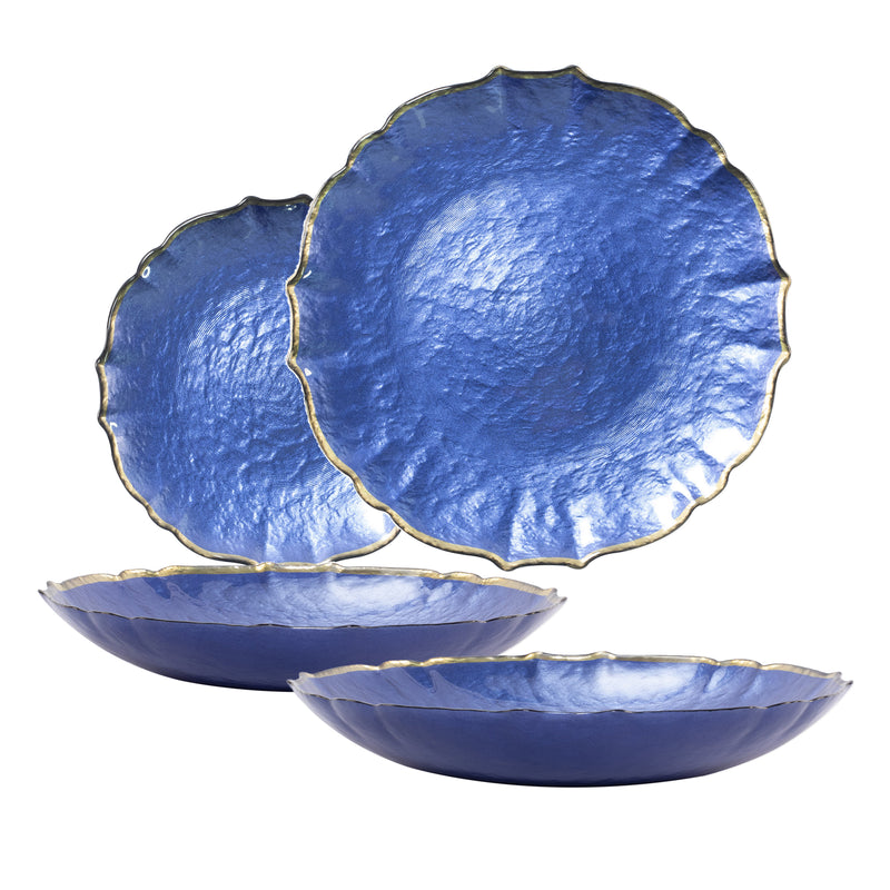 Cobalt blue glass dinnerware set with scalloped rims and baroque-style edges