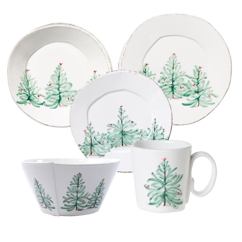 Ceramic holiday dinnerware set with pine tree motif plates, bowls, and mug