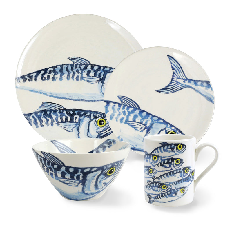 Blue and white fish-pattern dinnerware set with plates, bowl, and mug