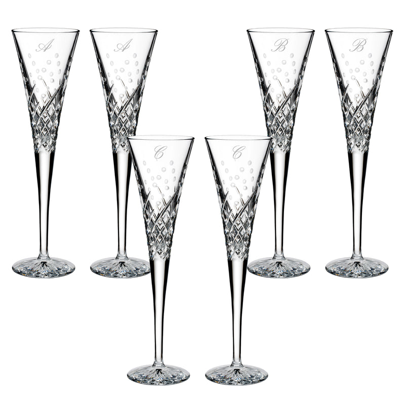 Set of 2 clear crystal toasting flutes with diamond pattern and script initial engraving