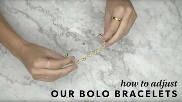 Bolo bracelet YouTube video. Model showing how to adjust.