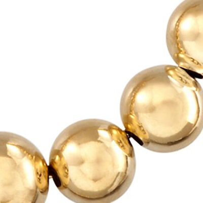 Gifts Under $250. Image Featuring Gold Bead Necklace