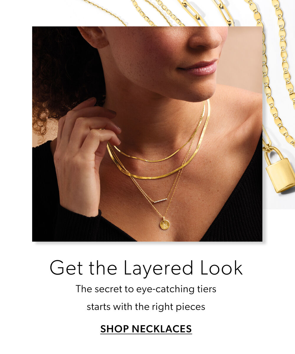 Get The Layered Look. The Secret To Eye-Catching Tiers Starts With The Right Pieces. Start Layering Necklaces. Image Featuring A Model Wearing Layered Necklaces