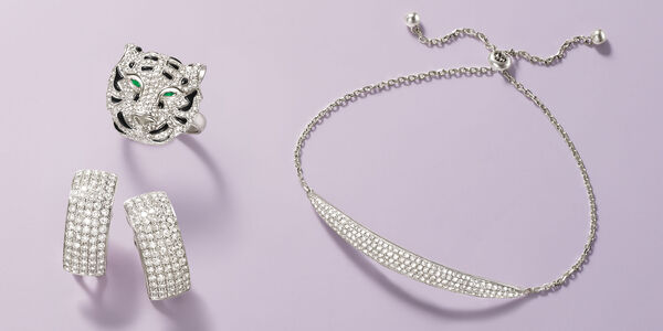 Diamond earrings, lion-head ring and bracelet.