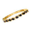 C. 1980 Vintage 5.85 ct. t.w. Sapphire Bangle Bracelet in 18kt Yellow Gold