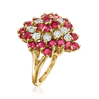 C. 1980 Vintage 2.20 ct. t.w. Ruby and .70 ct. t.w. Diamond Cluster Ring in 14kt Yellow Gold