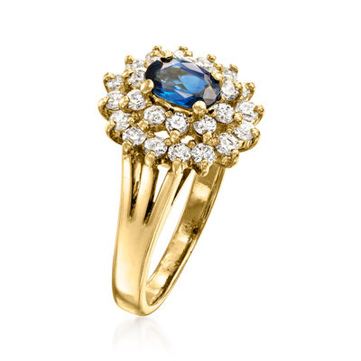 C. 1980 Vintage .55 Carat Sapphire and .80 ct. t.w. Diamond Ring in 14kt Yellow Gold