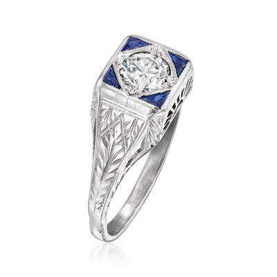 C. 1950 Vintage .50 Carat Diamond Ring with Synthetic Sapphire Accents in Platinum