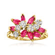 C. 1980 Vintage 1.20 ct. t.w. Ruby and .70 ct. t.w. Diamond Wave Ring in 14kt Yellow Gold