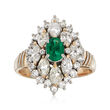 C. 1980 Vintage .38 Carat Emerald and 1.45 ct. t.w. Diamond Ring in 18kt Two-Tone Gold