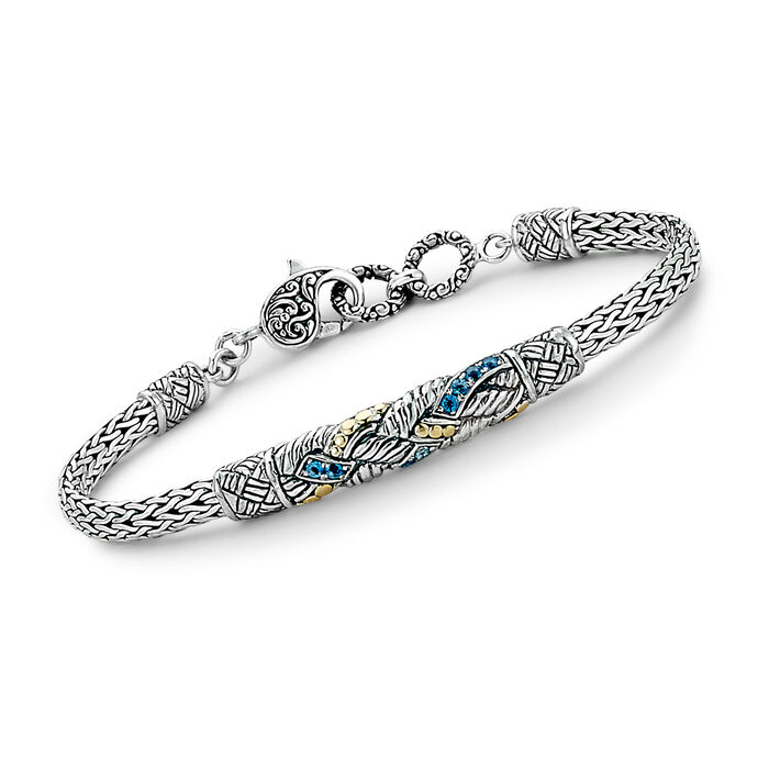 .30 ct. t.w. Swiss Blue Topaz Bali-Style Bracelet in Sterling Silver with 18kt Yellow Gold