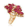 C. 1980 Vintage 2.60 ct. t.w. Ruby and .30 ct. t.w. Diamond Cluster Ring in 14kt Yellow Gold
