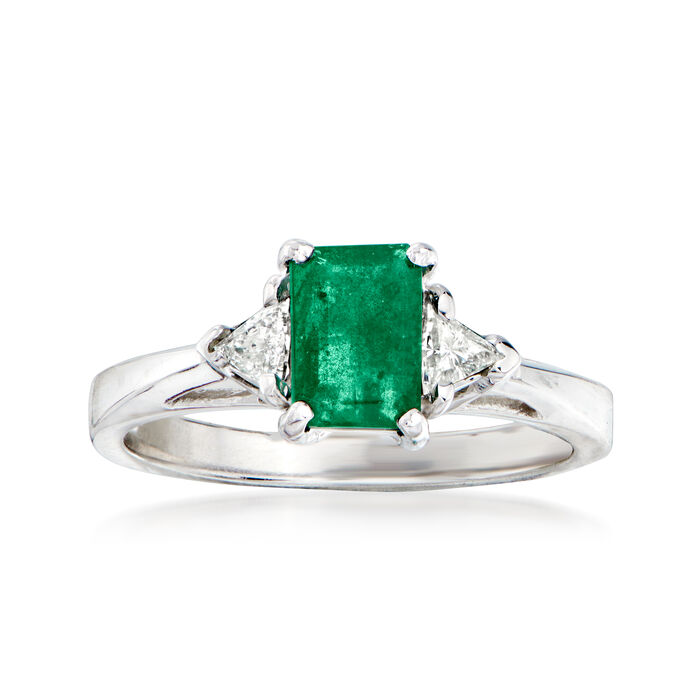 C. 1980 Vintage .75 Carat Emerald and .25 ct. t.w. Diamond Three-Stone Ring in Platinum