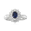 C. 1990 Vintage .69 Carat Sapphire and .43 ct. t.w. Diamond Halo Ring in Platinum