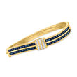 C. 1990 Vintage 5.20 ct. t.w. Sapphire and 1.00 ct. t.w. Diamond Wavy Bangle Bracelet in 18kt Yellow Gold