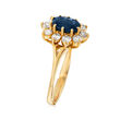 C. 1980 Vintage .90 Carat Sapphire and .50 ct. t.w. Diamond Ring in 14kt Yellow Gold
