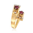 C. 1980 Vintage .85 ct. t.w. Ruby and .25 ct. t.w. Diamond Bypass Ring in 18kt Yellow Gold