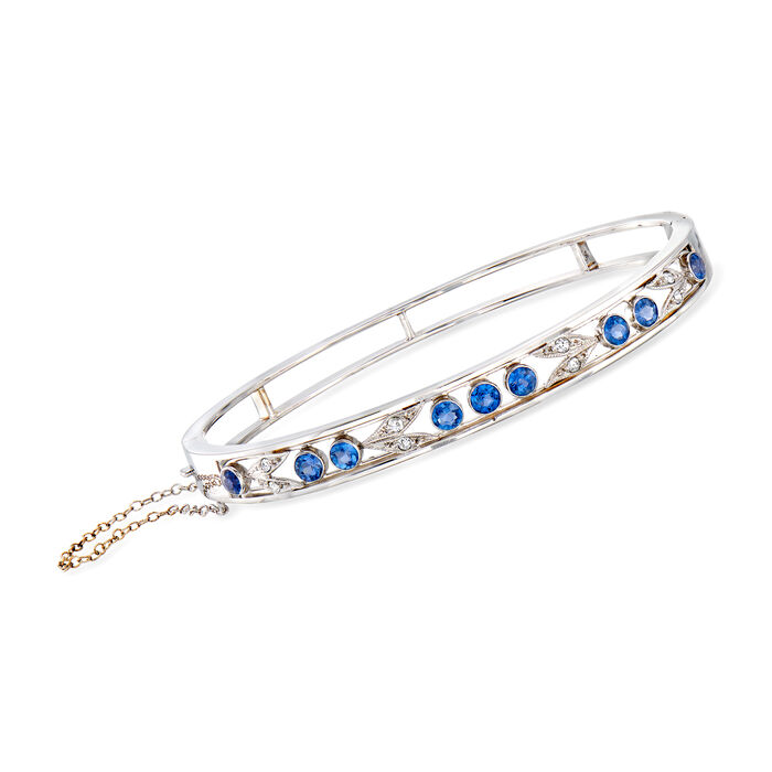 C. 1940 Vintage 1.80 ct. t.w. Sapphire and .20 ct. t.w. Diamond Bangle Bracelet in 14kt White Gold