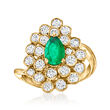 C. 1980 Vintage .55 Carat Emerald and 1.15 ct. t.w. Diamond Ring in 14kt Yellow Gold