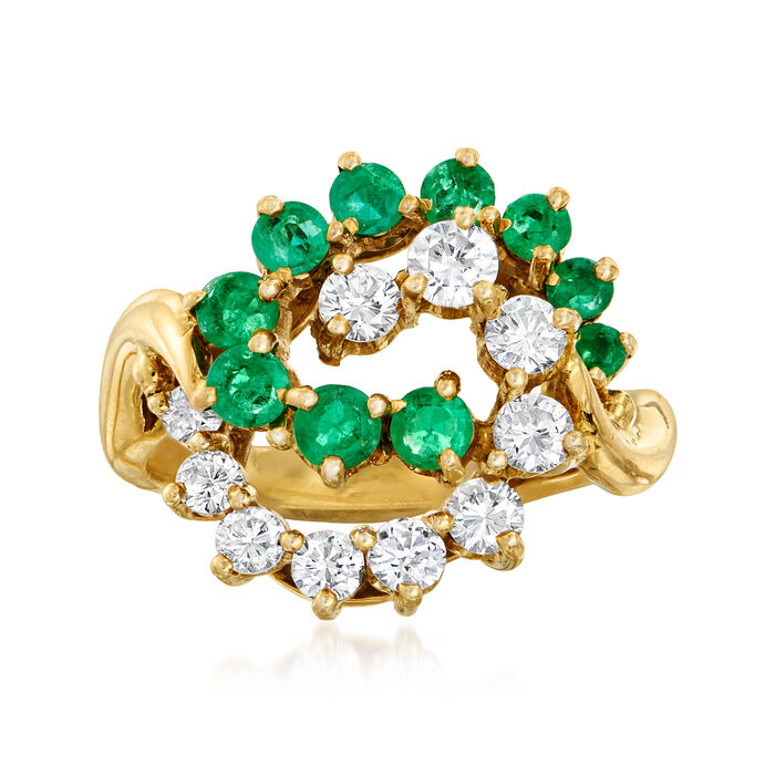 C. 1980 Vintage 1.00 ct. t.w. Emerald and .85 ct. t.w. Diamond Swirl Ring in 18kt Yellow Gold