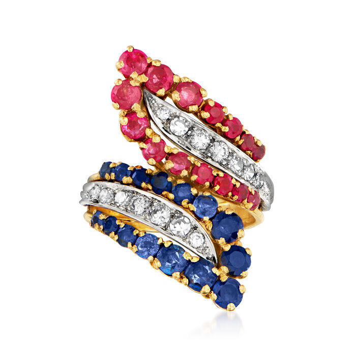 C. 1980 Vintage 1.25 ct. t.w. Ruby, 1.25 ct. t.w. Sapphire and .50 ct. t.w. Diamond Bypass Ring in 18kt Two-Tone Gold