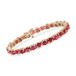 C. 1990 Vintage 8.00 ct. t.w. Ruby and 1.75 ct. t.w. Diamond Tennis Bracelet in 14kt Yellow Gold