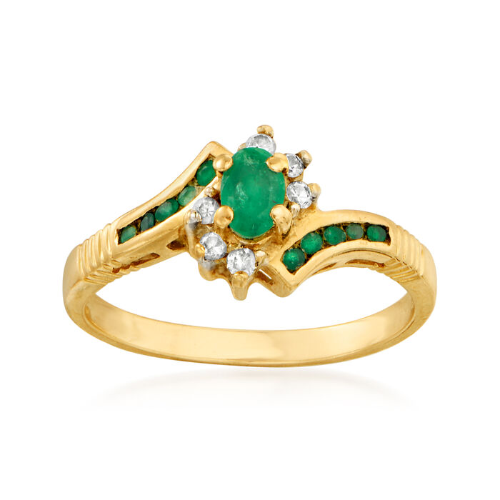 C. 1980 Vintage .45 ct. t.w. Emerald and .10 ct. t.w. Diamond Ring in 14kt Yellow Gold