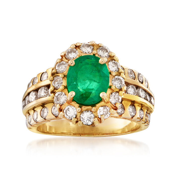 C. 1980 Vintage 1.00 Carat Emerald and 1.25 ct. t.w. Diamond Halo Ring in 14kt Yellow Gold