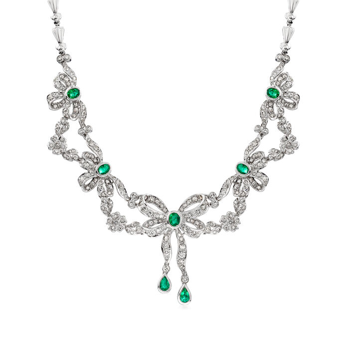C. 1980 Vintage 6.00 ct. t.w. Diamond and 2.05 ct. t.w. Emerald Bow Necklace in 18kt White Gold