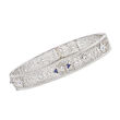 C. 1950 Vintage .50 ct. t.w. Diamond and .12 ct. t.w. Synthetic Sapphire Filigree Bangle Bracelet in 14kt White Gold