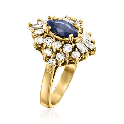 C. 1980 Vintage .60 Carat Sapphire and 1.00 ct. t.w. Diamond Cluster Ring in 14kt Yellow Gold