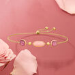 Italian Pink Opal and 1.60 ct. t.w. Ruby Bolo Bracelet in 14kt Yellow Gold