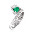 C. 1980 Vintage 1.00 ct. t.w. Diamond and .65 Carat Emerald Wrap Ring in 14kt White Gold