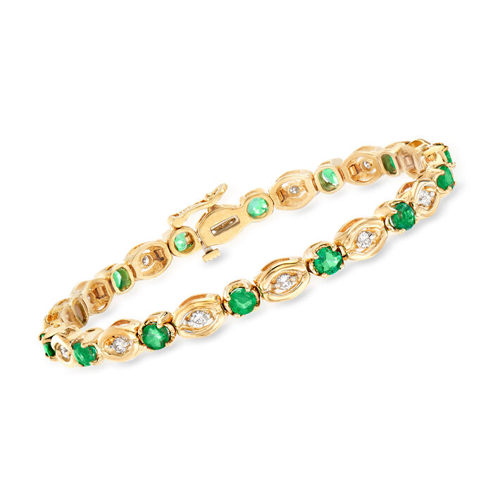 C. 1980 Vintage 2.80 ct. t.w. Emerald and .70 ct. t.w. Diamond Bracelet in 14kt Yellow Gold